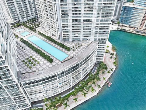 Huge, water-facing SE Corner Unit in the highly-sought after 10 Line of Icon Brickell near the very top of the building with Bay views all the way to Key Biscayne. Open Kitchen flowing into the Living Area with floor-to-ceiling windows along the enti...