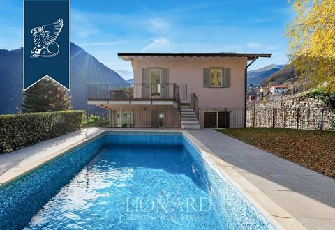 Luxurious newly built villa for sale on the panoramic side of the hill that dominates the picturesque lake locality of Argegno, less than five minutes from the banks of Lake Como. Built ten years ago in an elegant modern style, it has all the comfort...