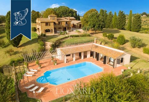A farmer house is sold in Tuscan with an area of ​​870 square meters and surrounded by a plot of 40,000 square meters with a pool and a view of Val d'Orcia. The main villa consists of three floors, the first floor are located: kitchen, living ro...