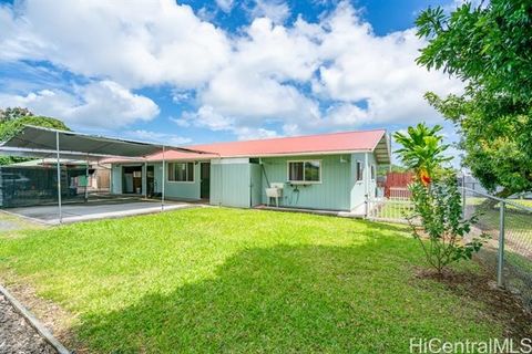 Discover comfort in this meticulously maintained three-bedroom, 2 1/2 bathroom home nestled in the heart of Hilo. Enjoy a spacious fenced yard with generous parking for both vehicles and boats. Abundant storage makes organizing your things worry free...