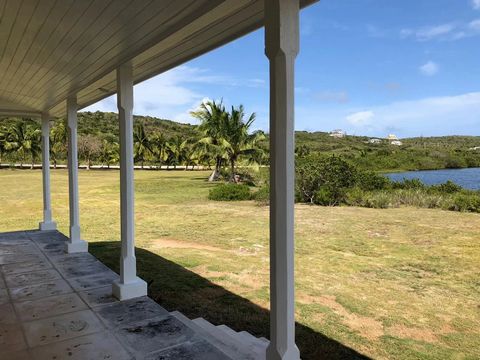 Live the Bahamian Dream with this Island View Property This exceptional property stretches from the Queens Highway to the waterfront, offering an idyllic setting to fully enjoy the beauty of the Bahamas. With hills and elevations of over 50 feet, as ...
