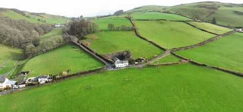 Located in a spectacular location with outstanding views across miles of Ceredigion open countryside, this detached property offers flexible living options with 7 acres of land. The main Cottage offers quirky accommodation with a cosy lounge, kitchen...
