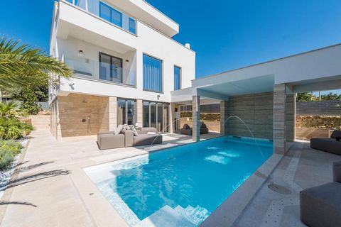 Location: Zadar Built: 2020 Zadar center: 23 km Airport distance: 31 km Inside space: 345 m2 Plot size: 806 m2 Bedrooms: 5 Bathrooms: 5 Swimming pool: 30 m2 Parking: 3 Air-conditioner Sauna Cameras Patio Garden Features: - Internet - Air Conditioning...