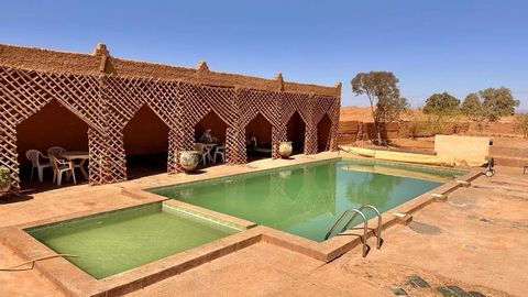 Découvrez notre oasis touristique unique à vendre au cœur du désert marocain! Cette oasis est située dans la banlieue de M'hamid El Ghizlane, au pied des magnifiques dunes, à seulement 1h30 de l'aéroport de Zagora. Avec une superficie de 7 hectares, ...