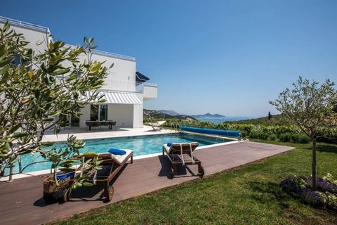 Awesome modern villa in a quiet location in the region of Dubrovnik just 650 meters from the sea, with wonderful sea views and mountain air. The living area is approx. 300 m² and is spread on three levels. Layout is the following: Ground floor: open-...
