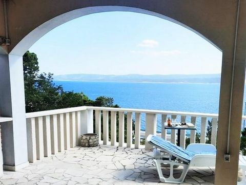 Unique offer on the 1st line to the sea on Omis Riviera, Lokva Rogoznica! Three apartments plus garage! This is an apart-house with direct sea view and total floorspace of 190 sq.m. on a large land plot of 1300 sq.m.   There is a possibility of swimm...