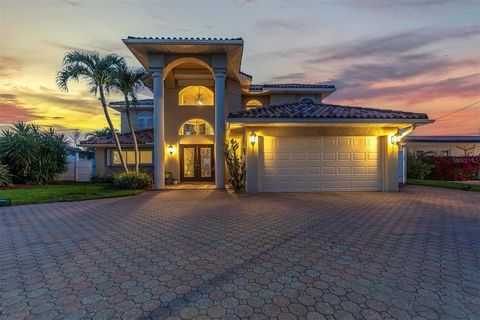 Welcome to Paradise where you can enjoy the luxury coastal living lifestyle! As you pull up you will notice the attention to detail starting with the paver circular driveway. High ceilings and grand entryway make this home stand out! This 4 bedroom, ...
