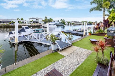 This stunning single-level luxury home is situated on a prime waterfront deep water canal with magnificent views. Imagine waking up to breathtaking views of the tranquil canal waters right from your bedroom window. Whether you're lounging by the pool...