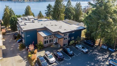 Don't miss this rare chance to own a top-floor, end-unit condo with unparalleled views of Lake Washington, the Cascades and Mount Rainier! This exceptional residence offers everything you could want, featuring a modernized kitchen, a spacious private...