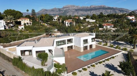 This exceptional property is a true embodiment of sophisticated and exclusive living. Situated in Altea, this modern villa is a one-of-a-kind gem, promising a lifestyle of utmost luxury and elegance. Nestled on a generous plot spanning 2,890 square m...