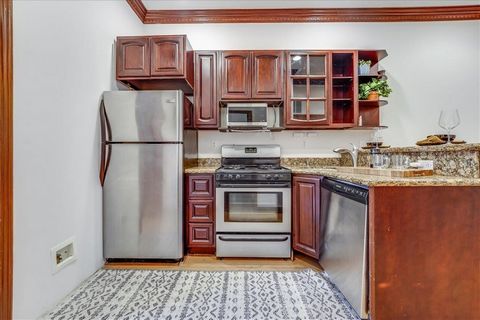 Settled on a quiet street in Jersey City Heights, this two bed, two bath home is the ideal blend of comfort, classic finishes and convenience. Just one block to Riverview Fisk Park with Manhattan skyline views, and 2nd Street Lightrail Station in Hob...