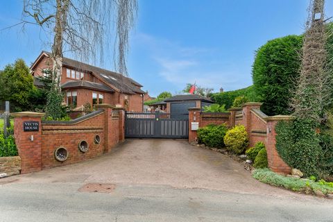 Accessed via electronic gates, this modern, extended, executive family home is located within the award winning and picturesque village of Harlaston. Sitting on a plot of approximately a 1/3 of an acre, this imposing family home has five bedrooms, tw...