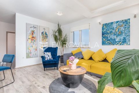 Just 350 m from the sea, there is a furnished two-bedroom apartment on two floors with a total size of 87.77 m2. The apartment consists of two bedrooms, a living room, two terraces, each arranged on one floor, a kitchen, a dining room, a bathroom, a ...