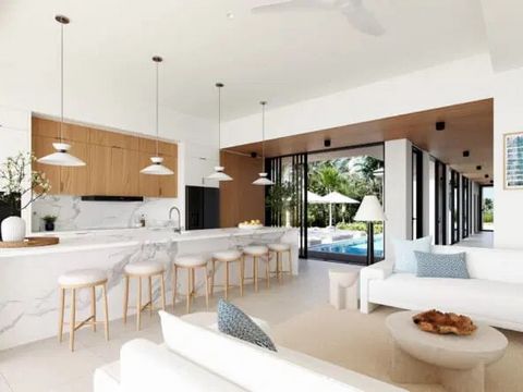 Anguilla Villa is a single level 2,874 sq ft home with 4 bedrooms and 4 bathrooms and an oasis courtyard pool. The symmetrical, transitionally design entranceway welcomes you through double doors into a spacious hallway with two of the four guest sui...