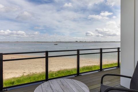 Welcome to your seaside sanctuary in Sint-Annaland, where relaxation meets breathtaking views in this charming first-floor apartment. Perfectly suited for up to 4 guests, this retreat offers an idyllic escape just steps from the sun-kissed beach. Upo...