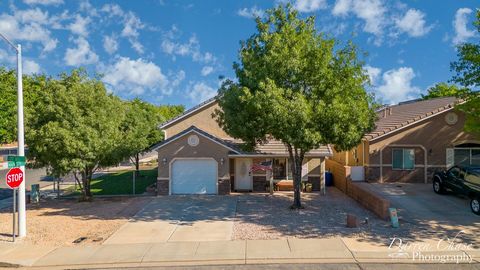 Discover the perfect corner lot home in thriving LaVerkin! This 3-bedroom, 2.5-bathroom treasure, complete with a 1-car garage, offers modern comfort without the hassle of an HOA. Nestled at the entrance to Zion National Park, this property isn't jus...