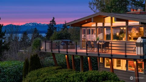 Perched in Fauntlee Hills, this mid-century gem offers sweeping wireless Puget Sound & Olympic Mountain views from nearly every room. Inside, every detail has been thoughtfully designed to create a space that’s as stunning as the views it frames. Dou...