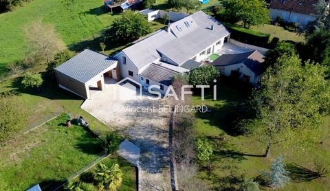 Maison d'environ 240m² 6 pièces avec garages et dépendances