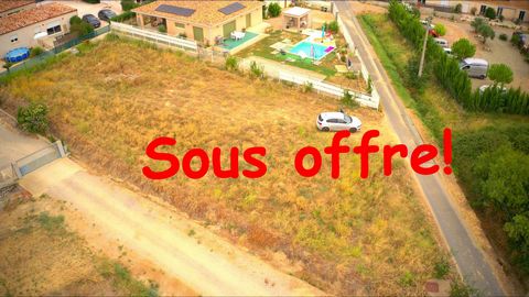 Terrain constructible en bordure du village de Pouzolles.