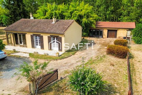 Jolie Maison de plain-pied avec 3 chambres, un terrain de 1861 m², une dépendance et garage.