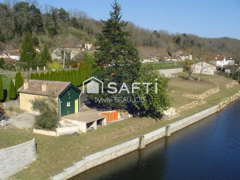 Maisonnette au bord de l'eau et 3 terrains